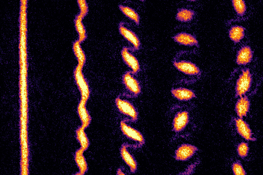 Physicists watch as ultracold atoms form a crystal of quantum tornadoes